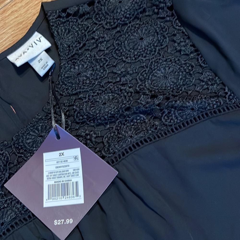 NWT Ava & Viv black blouse with bell sleeves. Size 2x. Super pretty and light!